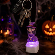 Light-up Halloween fidget keychain in a spooky night scene